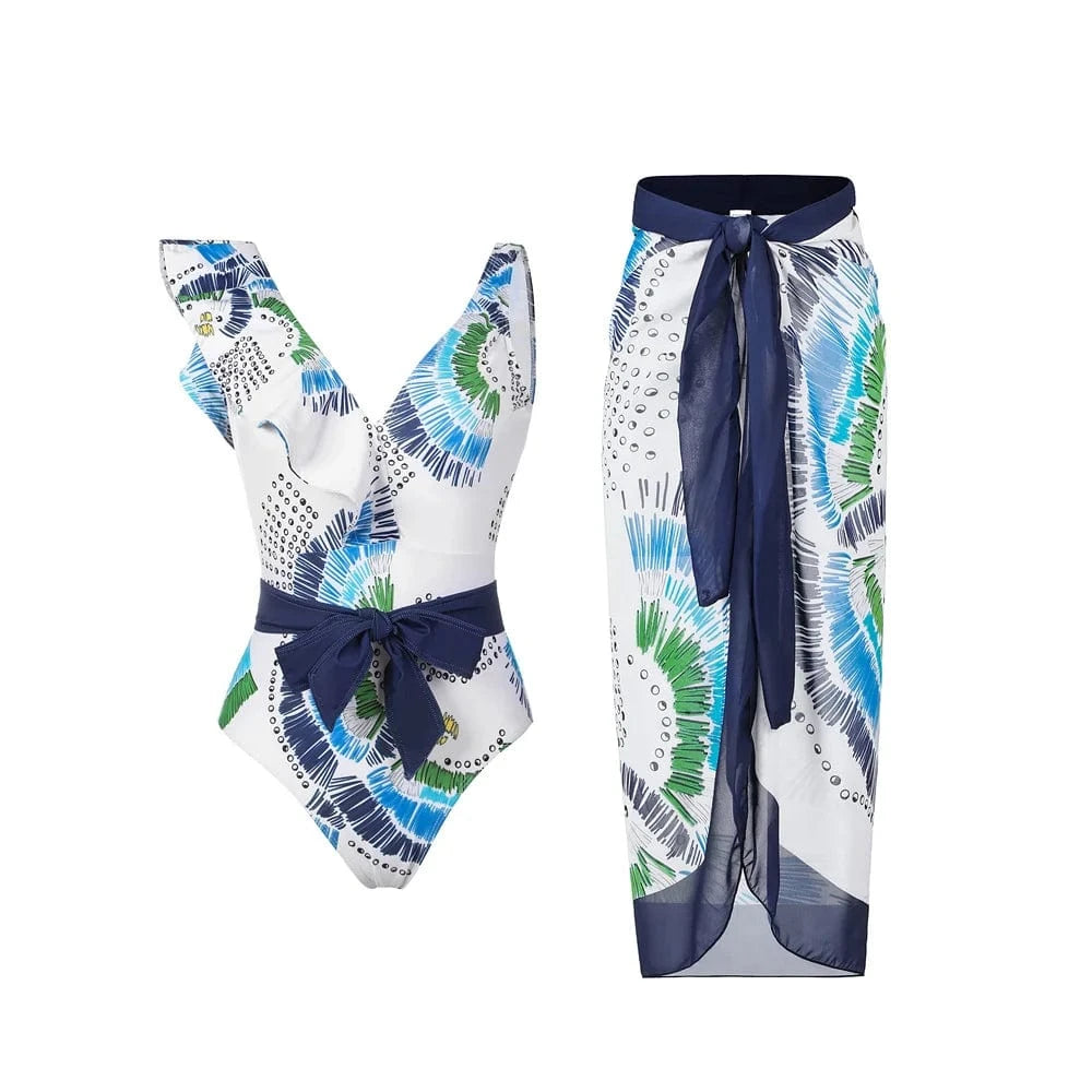 Maillot de bain une pièce imprimé coloré avec ceinture bleue et paréo assorti pour femme élégante.