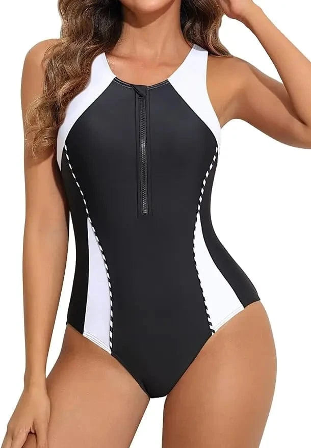 Maillot de bain une pièce femme élégant noir et blanc avec fermeture éclair frontale.