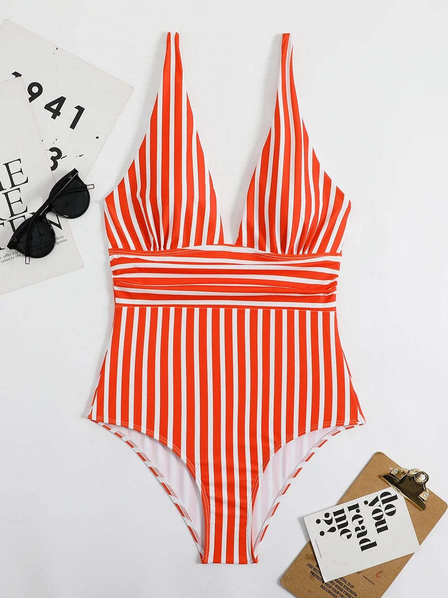 Maillot de bain une pièce élégant à rayures rouges et blanches pour un style moderne et chic.