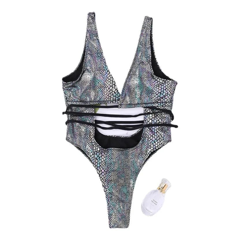 Maillot de bain femme une pièce au motif scintillant avec découpes sexy et design unique.