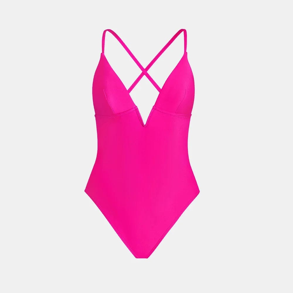 Maillot de bain une pièce rose vibrant avec bretelles croisées, idéal pour un style élégant.