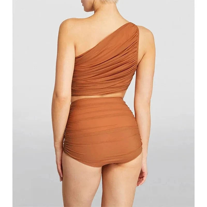 Maillot de bain femme asymétrique couleur terracotta, taille haute, style élégant et moderne.