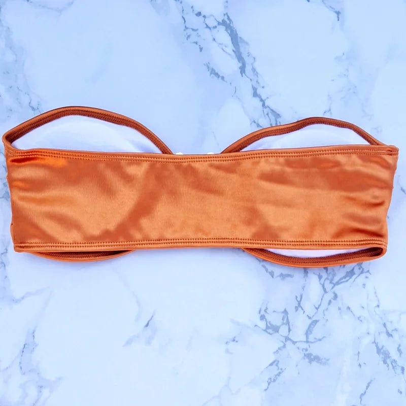 Maillot de bain femme bandeau orange élégant, parfait pour un look estival tendance et chic.