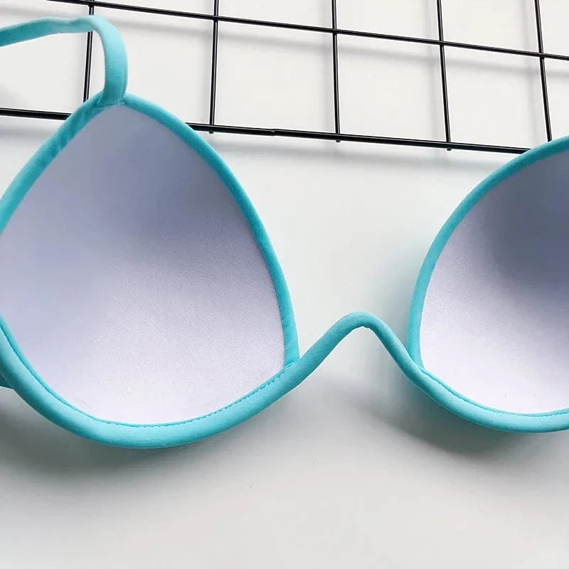 Maillot de bain bikini push-up turquoise pour femmes, design moderne et élégant pour l'été.