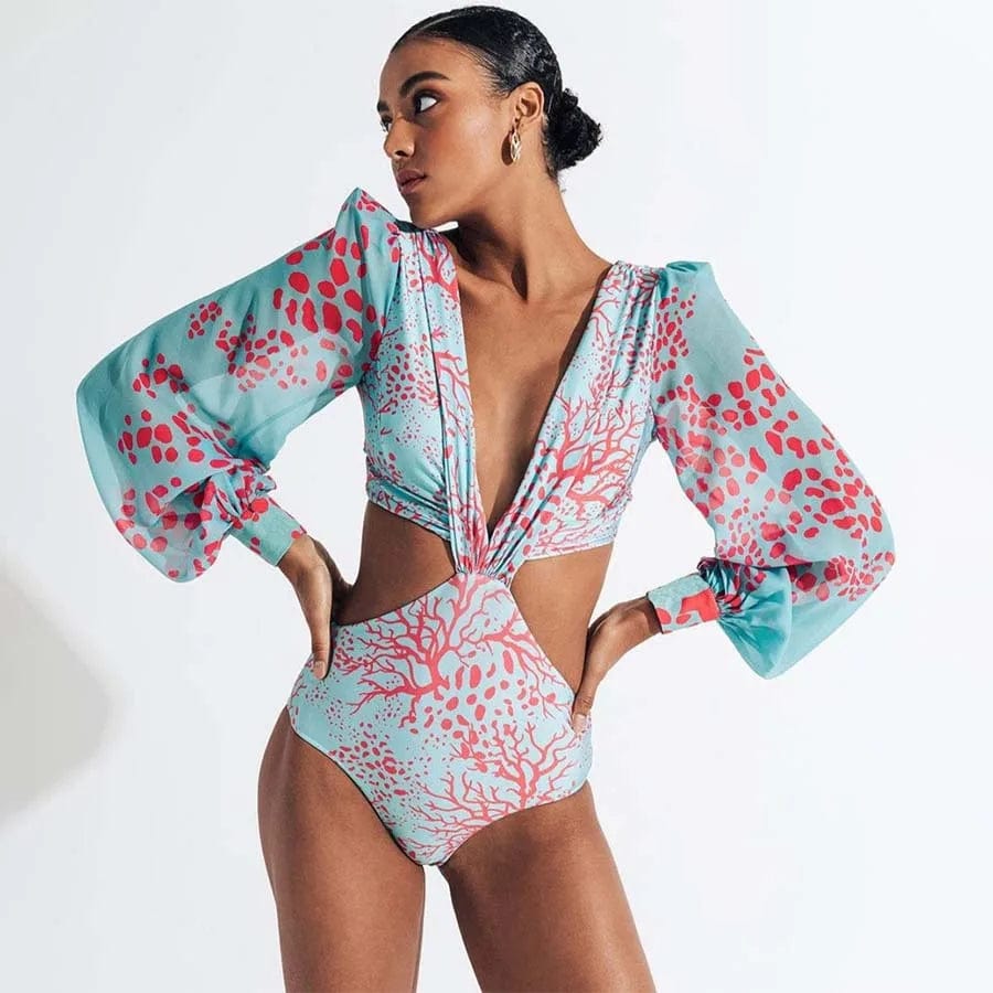 Maillot de bain femme imprimé corail manches longues, élégant et tendance pour l'été.