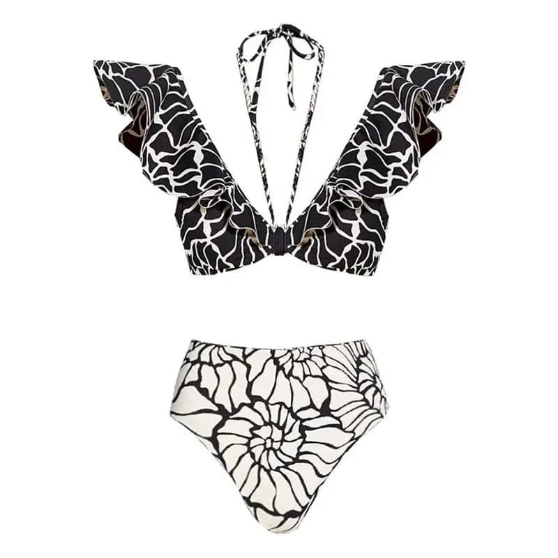 Maillot de bain élégant à motif noir et blanc avec volants, parfait pour l'été à la plage.