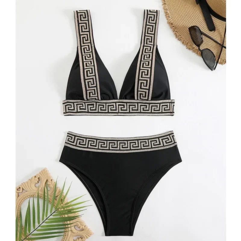 Maillot de bain noir deux pièces pour femme avec motifs géométriques tendance et élégants.
