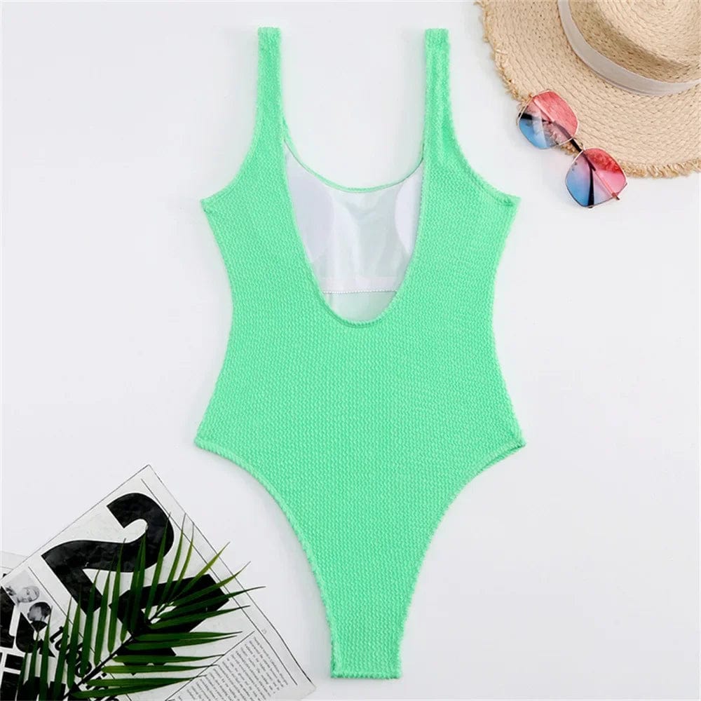 Maillot de bain femme une pièce vert clair, élégant pour l'été, idéal plage ou piscine.