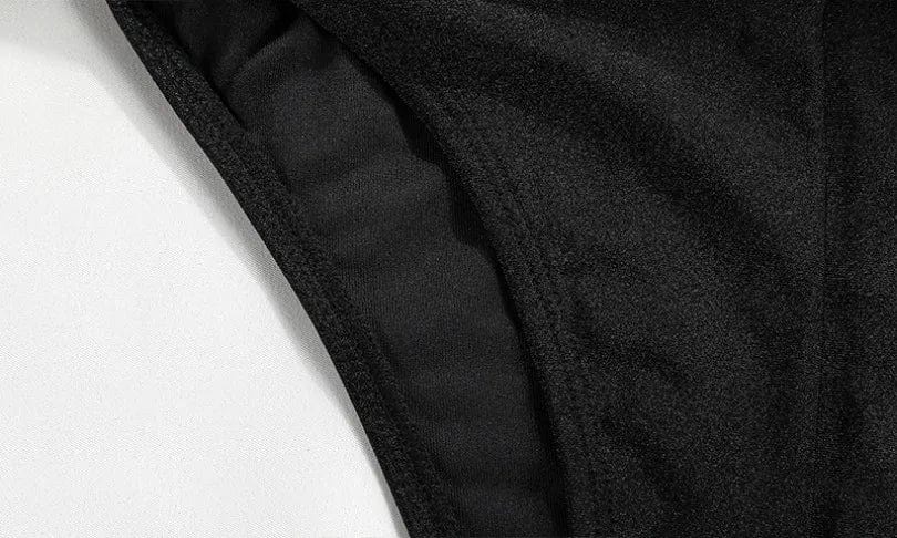 Maillot de bain femme une pièce noir, style élégant et sexy, idéal pour l'été.